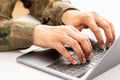 Military person typing