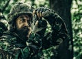 Military photojournalist documenting war, military press photographer. Ukrainian soldier in army. Russian military