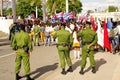 Military police overseeing gathering of Cuban people