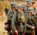 Military re - enactors in German uniform world war II. German soldiers.