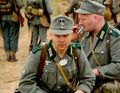 Military re - enactors in German uniform world war II. German soldiers.