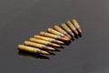 Military rifle bullets On a black background