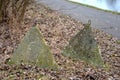 Military roadblock in the form of concrete pyramids to stop light armored vehicles and tanks. they can be used in combination with Royalty Free Stock Photo