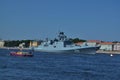 Military ship of Russian Navy and small boat