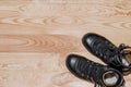 Military shoes boots on the background light polished board. Uniform, protection of soldiers, reliable shoes Royalty Free Stock Photo