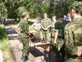 Military shows adolescents military equipment.