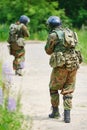 Military soldier armed with rifle gun