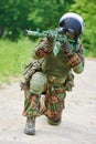 Military soldier with assault rifle