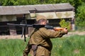 Military soldier holding soviet machine gun Degtyaryov