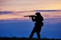 Military soldier silhouette with machine gun