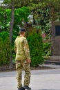 Military soldiers in the dismissal without a weapon walk around the city