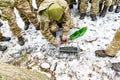 Military soldiers explode a bomb with a detonator