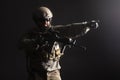 Military special forces in uniform with weapons attack at night, elite troops, counter-terrorist against a dark background Royalty Free Stock Photo