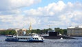 Military submarine and pleasure boat