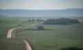 Military tank moving in a field Royalty Free Stock Photo