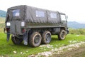 Military truck parked on hill