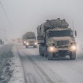 Military truck traveling in fog