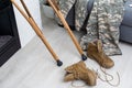 military uniform with crutches. disability