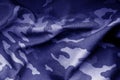Military uniform pattern with blur effect in blue tone. Royalty Free Stock Photo