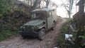 Military vehicle exponent in the wood walking path