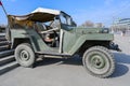 A military vehicle, an old military vehicle from the Second World War on a snow-covered city street. Soviet Two World War Four- Royalty Free Stock Photo