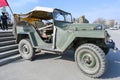 A military vehicle, an old military vehicle from the Second World War on a snow-covered city street. Soviet Two World War Four- Royalty Free Stock Photo