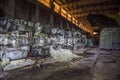 Military warehouse with rusted tank diesel engines Royalty Free Stock Photo