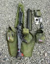Military, weapon and gun with cleaning kit on ground outdoor for service, mission or protection of soldier. Rifle