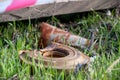 military weapon mine in green grass on a city street in Ukraine