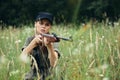 Military woman Woman with weapon hunting hideout lifestyle black cap