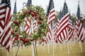 Military wreath and American flags in Veterans Day display Royalty Free Stock Photo