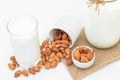 Milk Almonds in a glass on white background