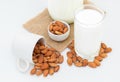 Milk Almonds in a glass on white background