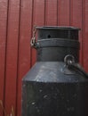 Milk barrel in black with red background and nice details Royalty Free Stock Photo