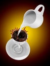 Milk being poured into small cup of coffee. 3d Royalty Free Stock Photo