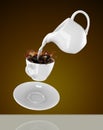 Milk being poured into small cup of coffee. 3d