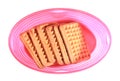 Milk biscuits in a pink snack plastic box with cap. Royalty Free Stock Photo