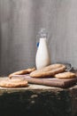 Milk bottle and sweet pastry Royalty Free Stock Photo