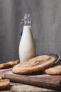 Milk bottle and sweet pastry Royalty Free Stock Photo