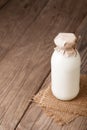 Milk bottle on wood table