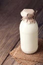 Milk bottle on wood table