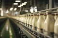 Milk bottles on a conveyor belt in a modern dairy factory Royalty Free Stock Photo