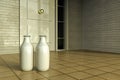 Milk bottles in front of the door of a house at the early morning