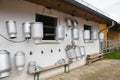 Milk buckets outside German farm for cows Royalty Free Stock Photo