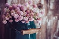 Milk can, and a bouquet Royalty Free Stock Photo