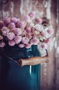 Milk can, and a bouquet Royalty Free Stock Photo