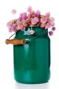 Milk can and a bouquet Royalty Free Stock Photo