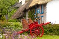 Milk cart and churns Royalty Free Stock Photo