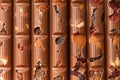 Milk chocolate with nuts, raisins as a background Royalty Free Stock Photo