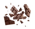 Milk chocolate pieces falling Royalty Free Stock Photo